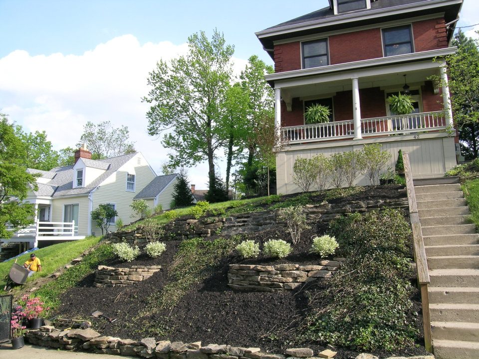 retaining wall with landscape on top and bottom